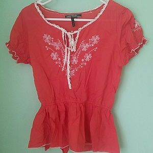 Love stitch orange blouse.